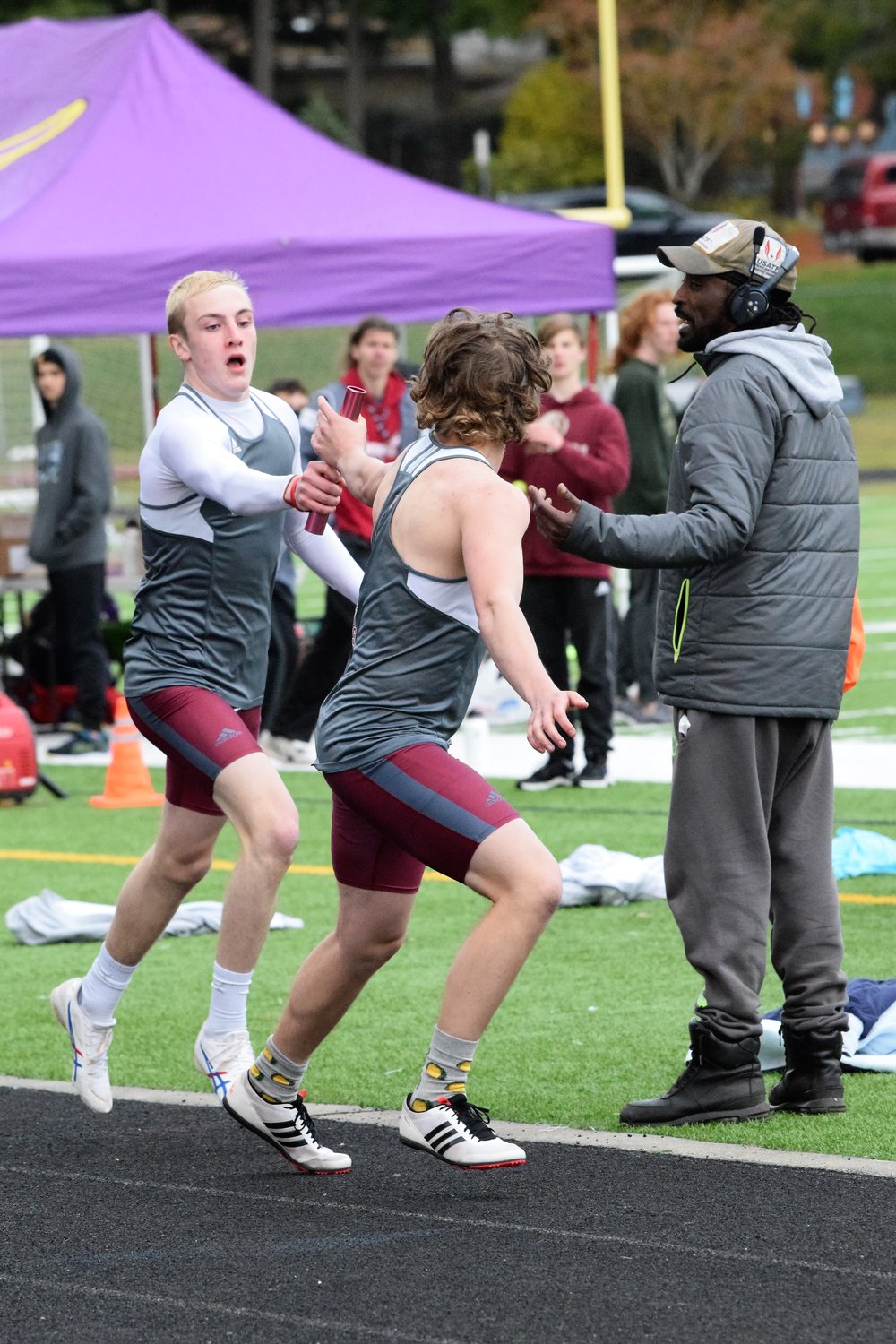 W.F. West's Lucas Hoff hands the baton to Charlie Mallonee in a relay at the Lil Norway Invite April 16.
